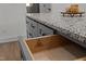 Close up of a kitchen drawer and granite counter featuring JCK Cabinetry craftsmanship at 111 Halifax Rd, Louisburg, NC 27549