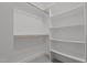 Large walk-in closet with built-in shelving and plenty of space for storage at 111 Halifax Rd, Louisburg, NC 27549