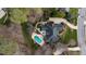 Aerial view showcases this home's pool, patio, and landscaped backyard at 111 San Juan Dr, Chapel Hill, NC 27514