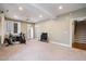 Open basement area with access to the backyard and staircase at 111 San Juan Dr, Chapel Hill, NC 27514