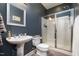 Bathroom with blue walls, vessel sink, stand-up shower at 111 San Juan Dr, Chapel Hill, NC 27514