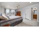 Serene bedroom with soft lighting, carpet, and ensuite bathroom access at 111 San Juan Dr, Chapel Hill, NC 27514