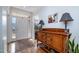 Welcoming foyer with hardwood floors, a console table, and front door with sidelights at 111 San Juan Dr, Chapel Hill, NC 27514