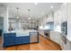 Well-equipped kitchen with stainless appliances, a blue island, and open layout at 111 San Juan Dr, Chapel Hill, NC 27514