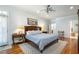 Spacious main bedroom with hardwood floors, ensuite bathroom, and ample natural light at 111 San Juan Dr, Chapel Hill, NC 27514