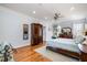 Comfortable main bedroom with hardwood floors, decorative rug and plenty of storage at 111 San Juan Dr, Chapel Hill, NC 27514