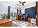Bright home office featuring a large window, hardwood floors, and traditional furnishings at 111 San Juan Dr, Chapel Hill, NC 27514