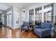 Bright sunroom with ample windows providing natural light and views of the surrounding landscape at 111 San Juan Dr, Chapel Hill, NC 27514