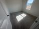 Bright bedroom featuring neutral carpeting and a window with a view of the outdoors at 11778 Salers Loop, Middlesex, NC 27557