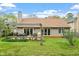 Beautiful backyard with a wood pergola and patio area for outdoor enjoyment at 11821 Fairlie Pl, Raleigh, NC 27613