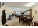 Open concept dining area flows into the living room offering comfortable and versatile living at 11821 Fairlie Pl, Raleigh, NC 27613