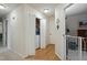 Hallway area with bi-fold doors to in-unit washer and dryer at 11821 Fairlie Pl, Raleigh, NC 27613