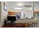 Kitchen featuring a breakfast bar and stainless steel appliances at 11821 Fairlie Pl, Raleigh, NC 27613