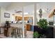 Open concept kitchen featuring breakfast bar and pendant lighting at 11821 Fairlie Pl, Raleigh, NC 27613