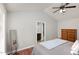 Bedroom showcasing vaulted ceiling, updated flooring, and view to bath at 120 Renee Dr, Wilson's Mills, NC 27577