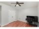 Bedroom featuring laminate flooring, ample space, and closet at 120 Renee Dr, Wilson's Mills, NC 27577