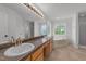 This bathroom features a large double vanity, soaking tub, and separate shower at 1308 Aspen Falls Ct, Willow Springs, NC 27592