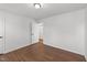 This bedroom features neutral paint and flooring and a door to an additional closet at 1308 Aspen Falls Ct, Willow Springs, NC 27592