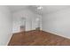 This bedroom features neutral paint and flooring and multiple doors at 1308 Aspen Falls Ct, Willow Springs, NC 27592