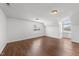Finished bonus room with hardwood flooring and natural light at 1308 Aspen Falls Ct, Willow Springs, NC 27592