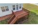 A close up aerial view of the home's wooden rear deck at 1308 Aspen Falls Ct, Willow Springs, NC 27592