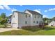 Side and rear of home, highlighting the two car garage and deck at 1308 Aspen Falls Ct, Willow Springs, NC 27592