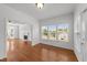 Living room featuring hardwood floors, a fireplace, and natural light at 1308 Aspen Falls Ct, Willow Springs, NC 27592