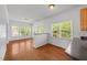 Bright, open living area features hardwood floors and plenty of natural light at 1308 Aspen Falls Ct, Willow Springs, NC 27592