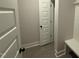 Hallway with built in bench and access to several rooms at 141 Ruskin Dr, Smithfield, NC 27577