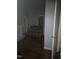 The bedroom includes hardwood floors, a sofa and an open door way to a closet at 1421 Blanton St, Rocky Mount, NC 27803