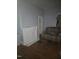 The bedroom includes hardwood floors, a fireplace and an open door way to a closet at 1421 Blanton St, Rocky Mount, NC 27803
