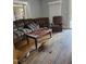 The living room features a large sectional, hardwood floors and a window with natural light at 1421 Blanton St, Rocky Mount, NC 27803