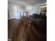 The living room features hardwood floors, a sofa and a window with natural light at 1421 Blanton St, Rocky Mount, NC 27803