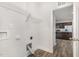 Laundry room with appliances hookups, with view of the kitchen at 15 Woodworkers Way, Clayton, NC 27520