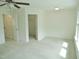 Bright bedroom with a ceiling fan and a walk-in closet at 1725 Mallard Trace Dr, Wendell, NC 27591