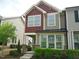 Charming two-story home with inviting curb appeal and colorful siding at 1725 Mallard Trace Dr, Wendell, NC 27591