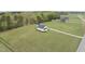 Aerial view of a charming home on sprawling acreage at 184 Mort Harris Rd, Louisburg, NC 27549