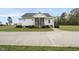 Charming one-story home with manicured lawn and concrete driveway at 184 Mort Harris Rd, Louisburg, NC 27549