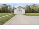 Detached garage with an artful design and concrete driveway at 184 Mort Harris Rd, Louisburg, NC 27549