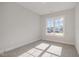 Bright bedroom with large window offering neighborhood views at 198 Ruskin Dr, Smithfield, NC 27577