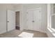 Bedroom with natural light, closet, and neutral carpeting at 198 Ruskin Dr, Smithfield, NC 27577