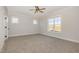 Spacious bedroom with ample natural light from large windows at 198 Ruskin Dr, Smithfield, NC 27577