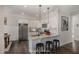 Modern kitchen features granite countertops, stainless steel appliances, and white cabinetry at 198 Ruskin Dr, Smithfield, NC 27577