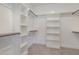 Large walk-in closet with built-in shelving and rods for ample storage at 198 Ruskin Dr, Smithfield, NC 27577