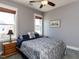 Serene bedroom with a decorative paisley-patterned bed and gray walls at 1980 Great Ridge Pkwy, Chapel Hill, NC 27516