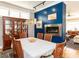 Sophisticated dining room featuring hardwood floors, a modern fireplace, and a stylish chandelier at 1980 Great Ridge Pkwy, Chapel Hill, NC 27516