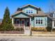Charming two-story home featuring a welcoming front porch, well-maintained landscaping, and stone accents at 1980 Great Ridge Pkwy, Chapel Hill, NC 27516