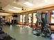 Well-equipped gym with modern machines and ample natural light, perfect for a complete workout at 1980 Great Ridge Pkwy, Chapel Hill, NC 27516