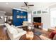 Bright living room featuring hardwood floors, neutral walls, and comfortable seating arrangement at 1980 Great Ridge Pkwy, Chapel Hill, NC 27516