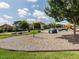 Fun playground with swings, slides, and climbing structures, set in a well-maintained green space at 1980 Great Ridge Pkwy, Chapel Hill, NC 27516